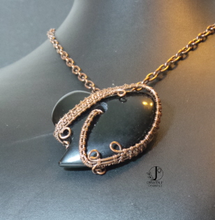 black stone wrapped heart